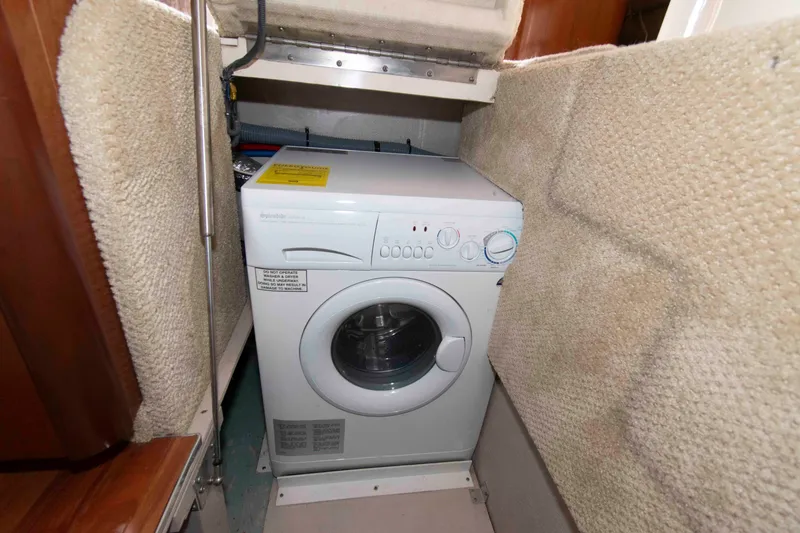 Slide: The Image of Washing machine in 2006 Sea Ray 44 Sedan Bridge yacht interior. - 23