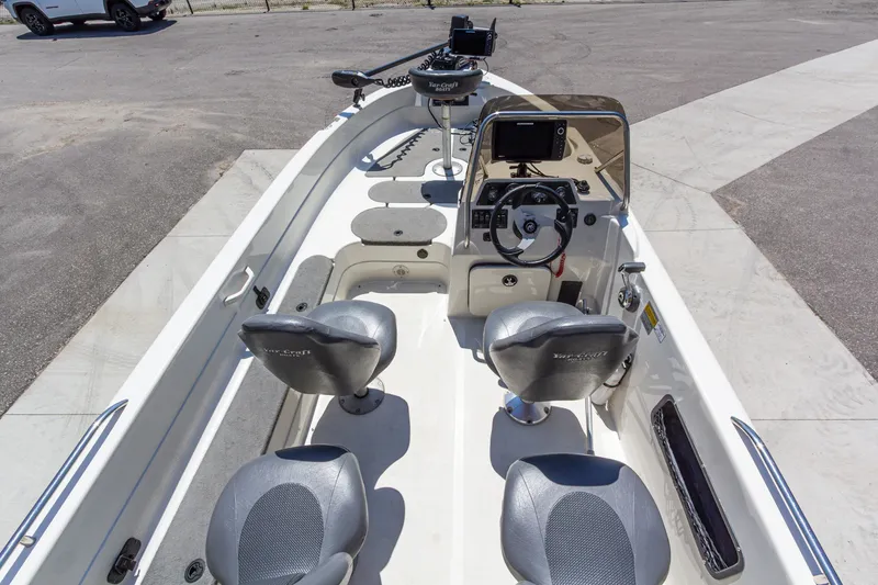 Slide: The Image of 2009 Yarcraft 1785 SC boat interior with steering console and seating. - 11