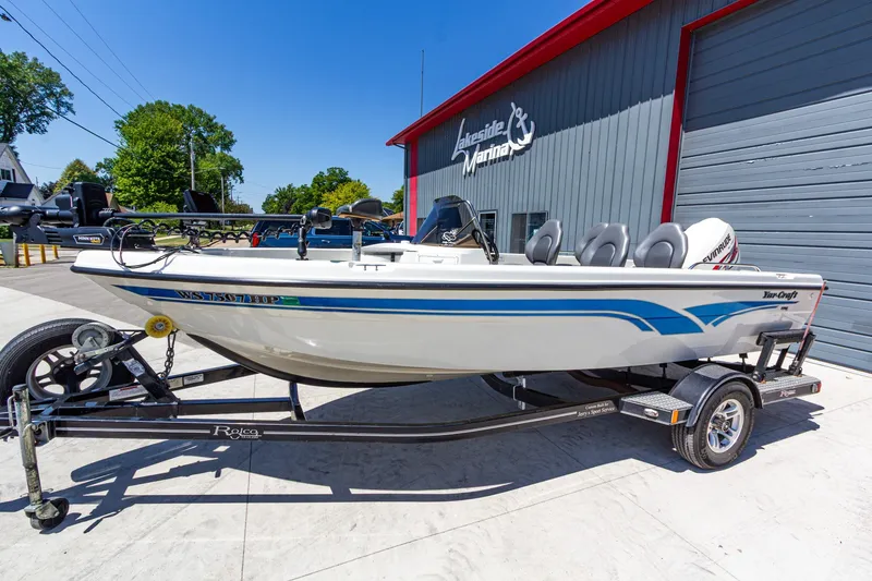 Slide: The Image of 2009 Yarcraft 1785 SC boat on trailer outside Lakeside Marina. - 9