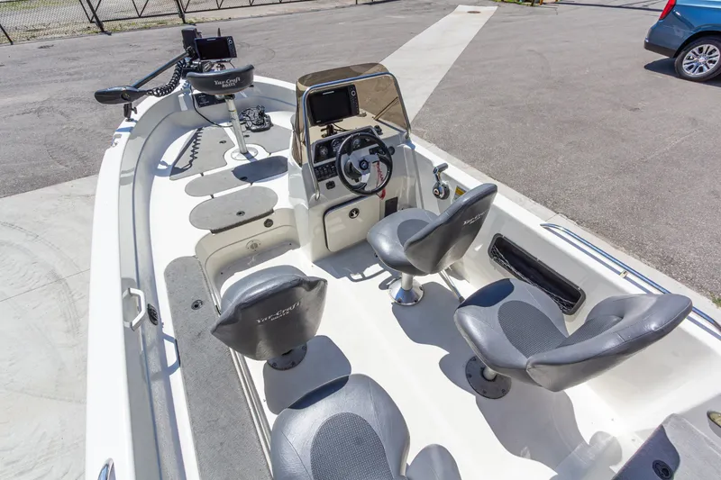 Slide: The Image of 2009 Yarcraft 1785 SC boat interior with steering console and seating arrangement. - 10