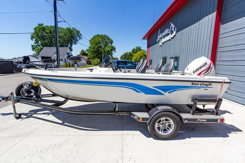 Slide: The Image of 2009 Yarcraft 1785 SC boat on trailer, parked outside Lakeside Marina. - 8