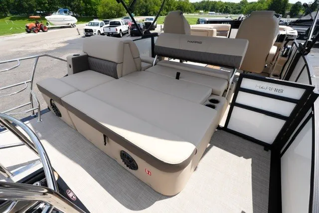 Slide: The Image of 2027 Harris Cruiser 210 SLDH pontoon boat with spacious seating and modern design. - 16