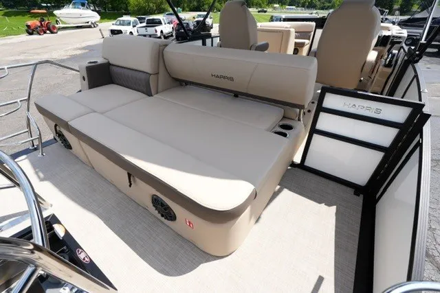Slide: The Image of 2027 Harris Cruiser 210 SLDH pontoon boat with beige seating and modern design. - 15