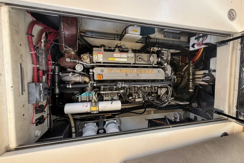 Slide: The Image of Engine compartment of a 2003 Ellis 36 Express Cruiser with Yanmar diesel engine. - 45