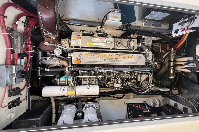 Slide: The Image of Engine compartment of a 2003 Ellis 36 Express Cruiser with Yanmar diesel engine. - 46