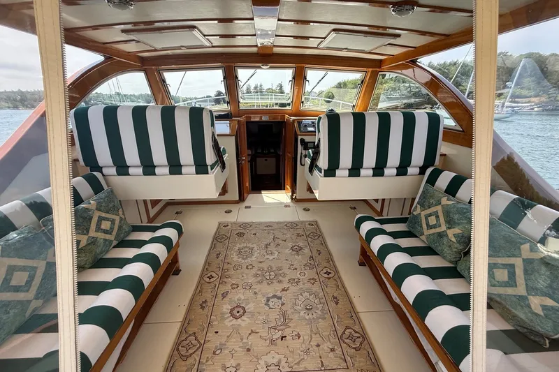 Slide: The Image of Luxurious interior of 2003 Ellis 36 Express Cruiser with striped seating and elegant decor. - 16