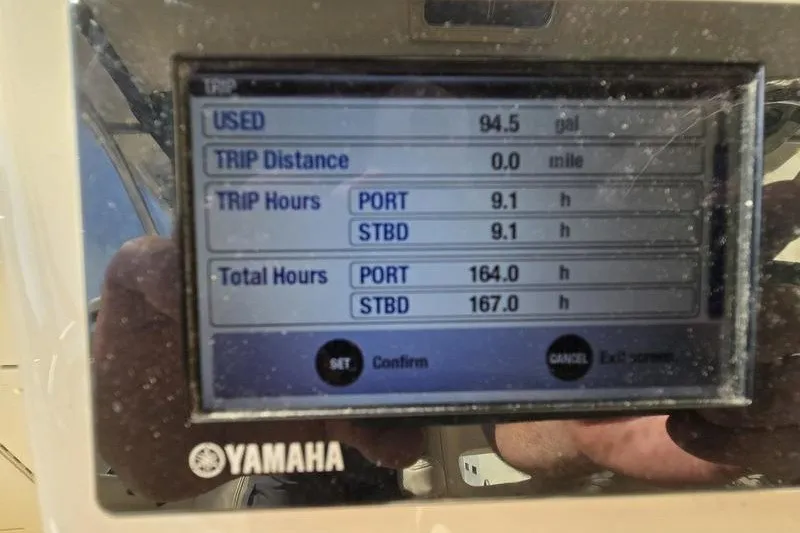 Slide: The Image of Yamaha display showing trip data for 2017 Grady-White Express 330 boat. - 17
