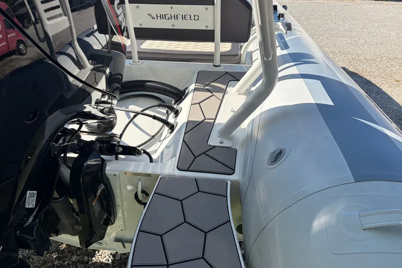 Slide: The Image of 2024 Highfield Sport 660 boat deck with modern design and equipment. - 18