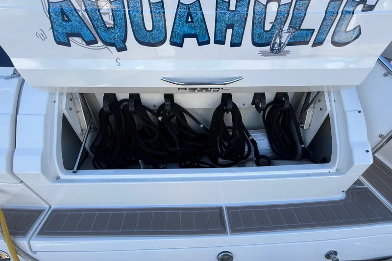 Slide: The Image of Storage compartment of a 2005 Regal Commodore 3560 IO boat with ropes inside. - 6
