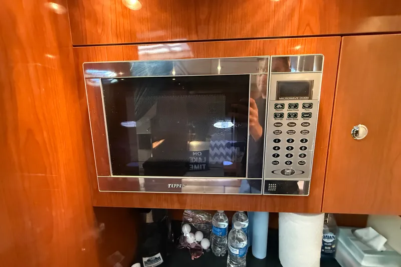 Slide: The Image of Built-in Tappan microwave in 2005 Regal Commodore 3560 IO yacht kitchen. - 43