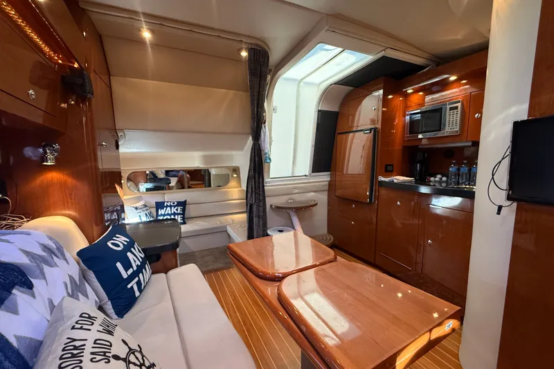 Slide: The Image of Luxurious interior of 2005 Regal Commodore 3560 IO yacht with modern amenities. - 57