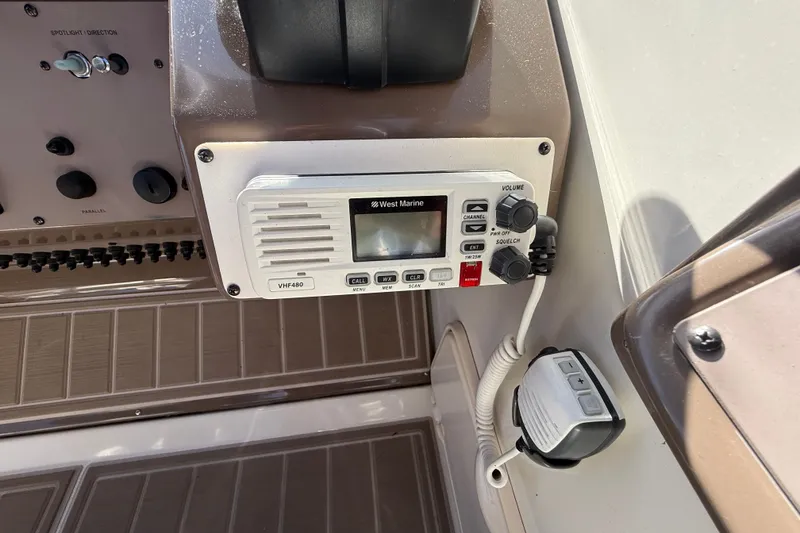 Slide: The Image of VHF radio on 2005 Regal Commodore 3560 IO boat dashboard. - 29