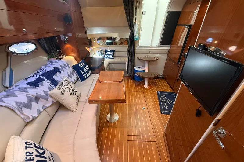 Slide: The Image of Luxurious interior of 2005 Regal Commodore 3560 IO yacht with cozy seating and modern amenities. - 46