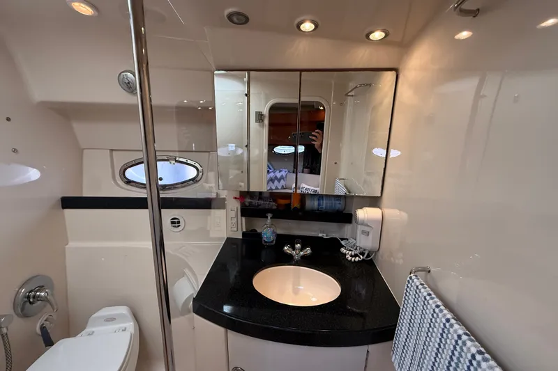 Slide: The Image of Luxurious bathroom interior of 2005 Regal Commodore 3560 IO yacht with modern fixtures. - 54