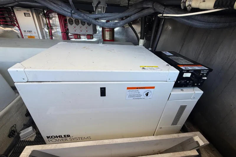 Slide: The Image of Kohler power system in 2005 Regal Commodore 3560 IO boat engine room. - 67