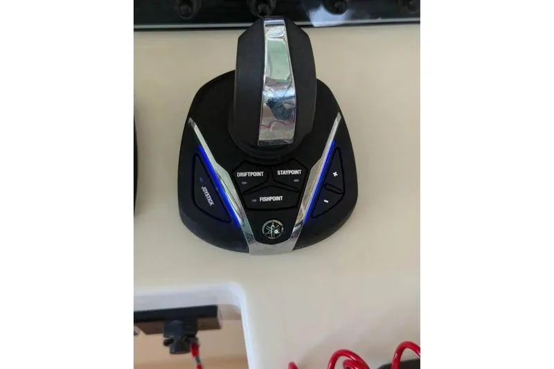 Slide: The Image of Joystick control panel on 2024 Grady-White Freedom 285 boat, featuring DriftPoint and FishPoint functions. - 48