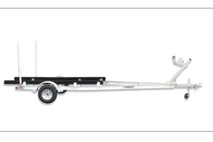 The Image of A Load Rite skiff trailer with a sturdy frame and wheel for transporting boats. - 1