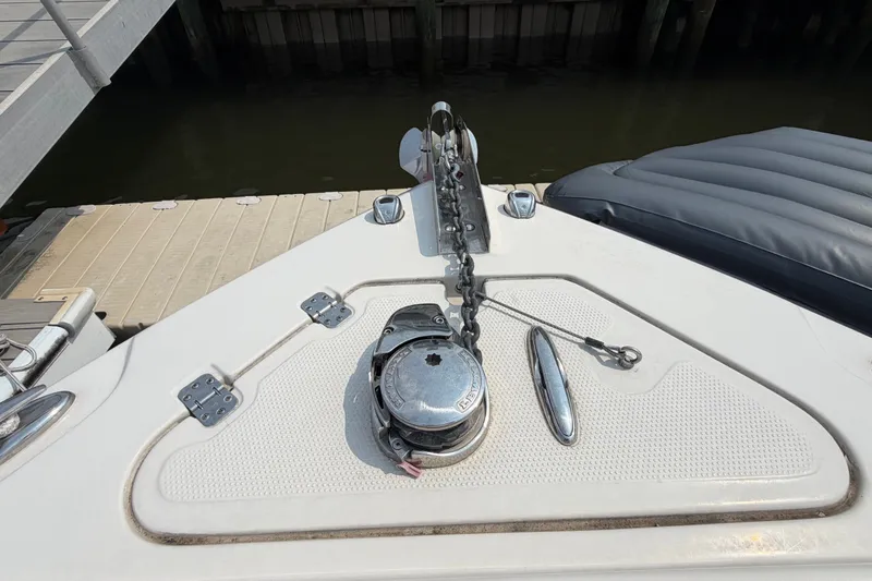 Slide: The Image of Bow of 2022 Sailfish 242 CC boat with anchor chain and winch. - 8