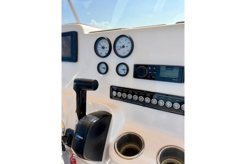 Slide: The Image of Dashboard of 2022 Tidewater 1910 Bay Max boat with gauges and controls. - 22
