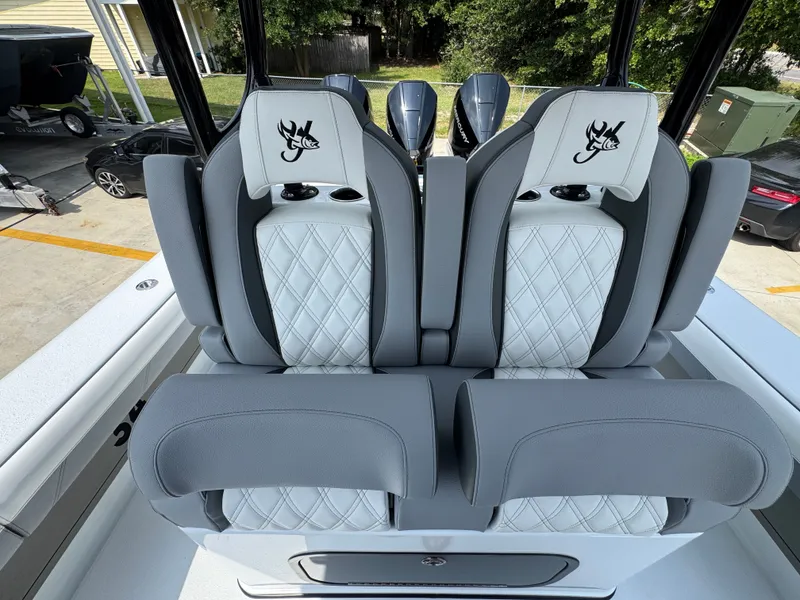 Slide: The Image of Luxury seating on 2027 Yellowfin 34 Offshore boat with diamond-stitched upholstery. - 33