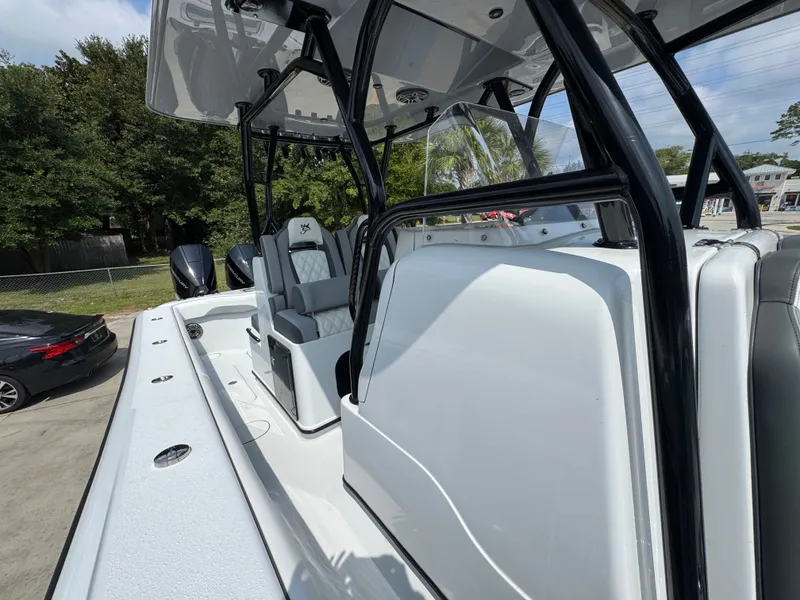 Slide: The Image of 2027 Yellowfin 34 Offshore boat with sleek design and modern seating. - 31