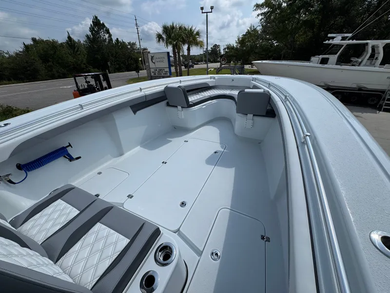 Slide: The Image of 2027 Yellowfin 34 Offshore boat interior with sleek seating and spacious deck design. - 20