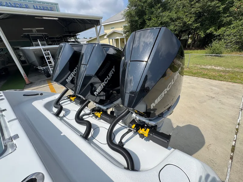 Slide: The Image of Triple Mercury outboard engines on a 2027 Yellowfin 34 Offshore boat. - 49