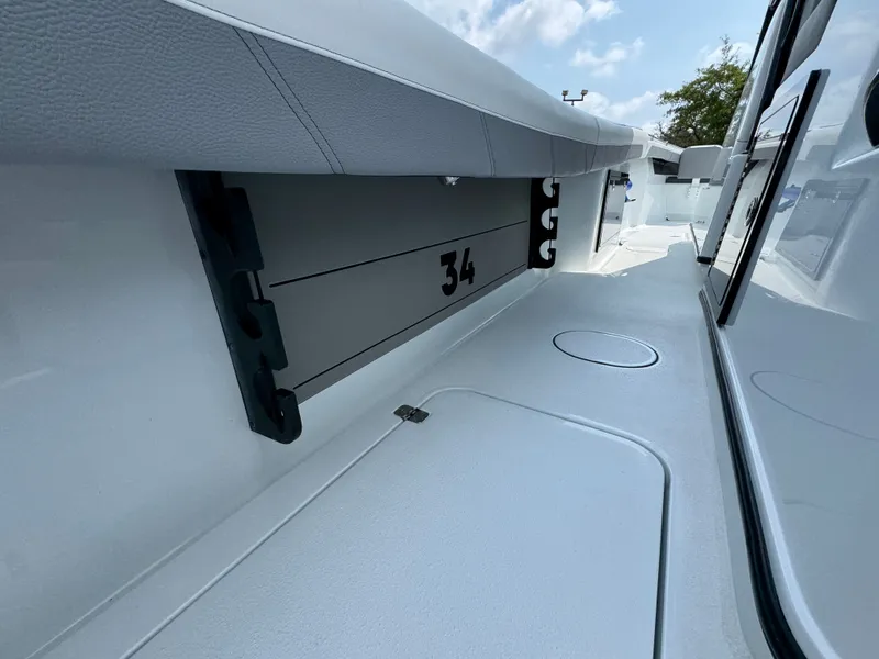 Slide: The Image of 2027 Yellowfin 34 Offshore boat interior, showcasing sleek design and modern features. - 44