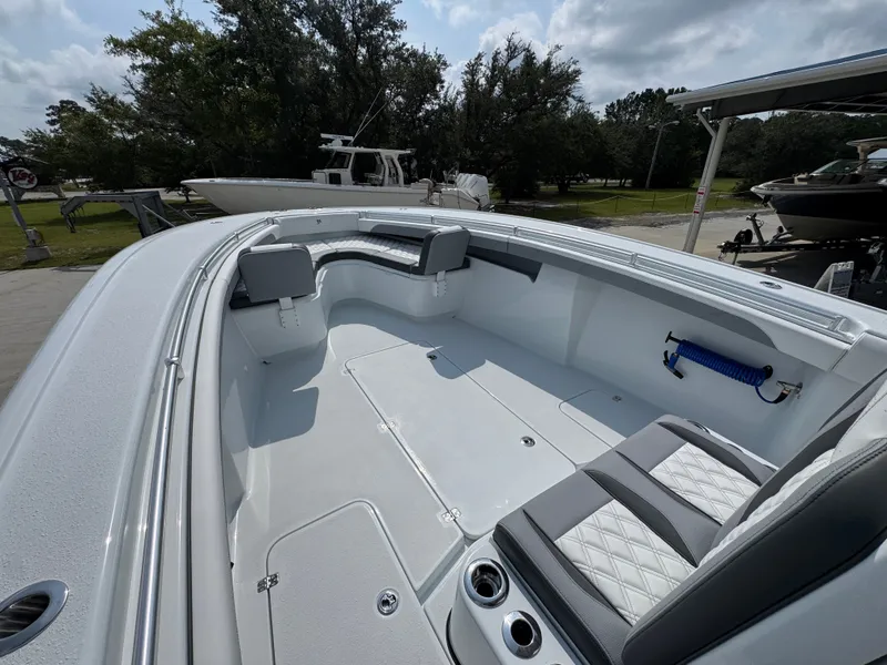 Slide: The Image of 2027 Yellowfin 34 Offshore boat interior with spacious seating and modern design. - 23