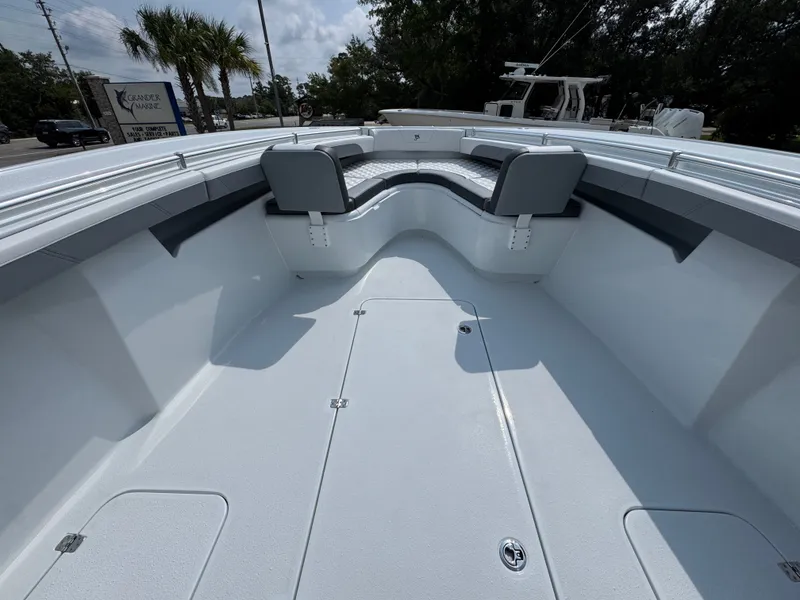 Slide: The Image of 2027 Yellowfin 34 Offshore boat interior with spacious seating and sleek design. - 21
