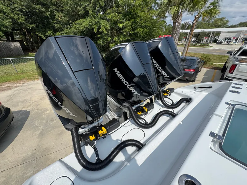 Slide: The Image of Triple Mercury outboard engines on a 2027 Yellowfin 34 Offshore boat. - 50