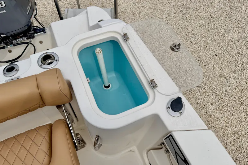 Slide: The Image of 2019 Wellcraft 262 Fisherman boat interior with livewell and seating detail. - 24
