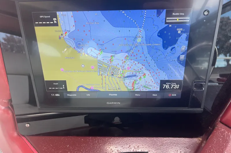 Slide: The Image of Garmin navigation display on 1990 Sea Ray Sundancer 350, showing nautical map and water temperature. - 5