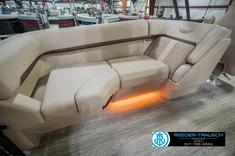 Slide: The Image of Luxurious seating on the 2026 Bennington 24 MSB pontoon boat with ambient lighting. - 50