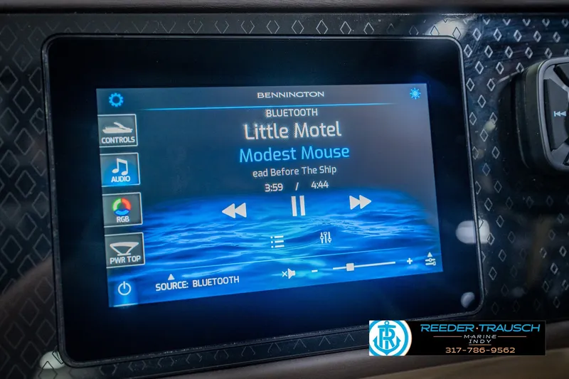 Slide: The Image of Touchscreen display in a 2026 Bennington 24 MSB boat showing music controls. - 41