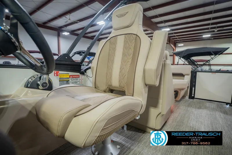 Slide: The Image of Luxurious interior of 2026 Bennington 24 MSB boat with plush seating. - 46