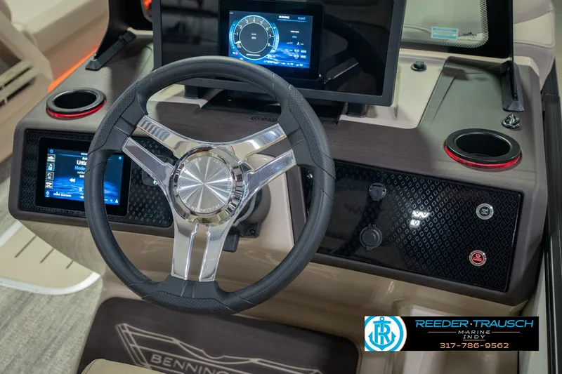 Slide: The Image of Steering console of 2026 Bennington 24 MSB boat with modern controls and displays. - 38