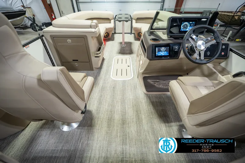 Slide: The Image of Interior of a 2026 Bennington 24 MSB boat with modern dashboard and seating. - 24