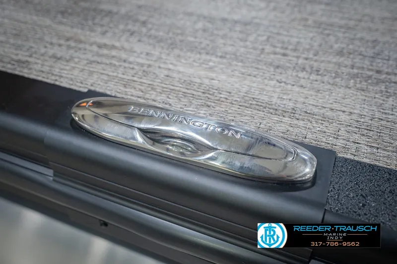 Slide: The Image of Close-up of a Bennington 24 MSB 2026 boat cleat on textured surface. - 59