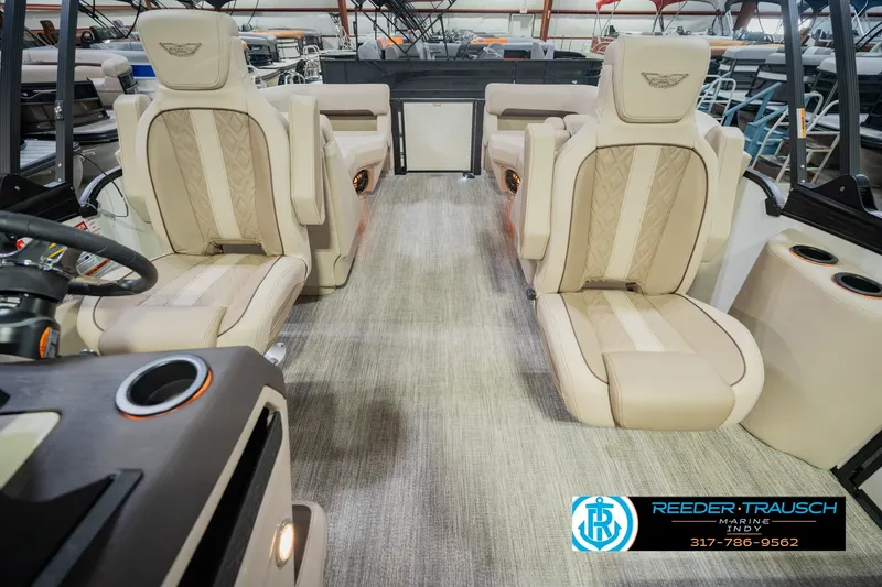 Slide: The Image of Luxurious interior of 2026 Bennington 24 MSB pontoon boat with plush seating. - 20
