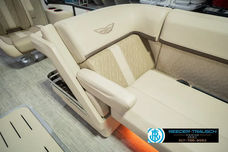 Slide: The Image of Luxurious seating on a 2026 Bennington 24 MSB boat with elegant beige upholstery. - 29