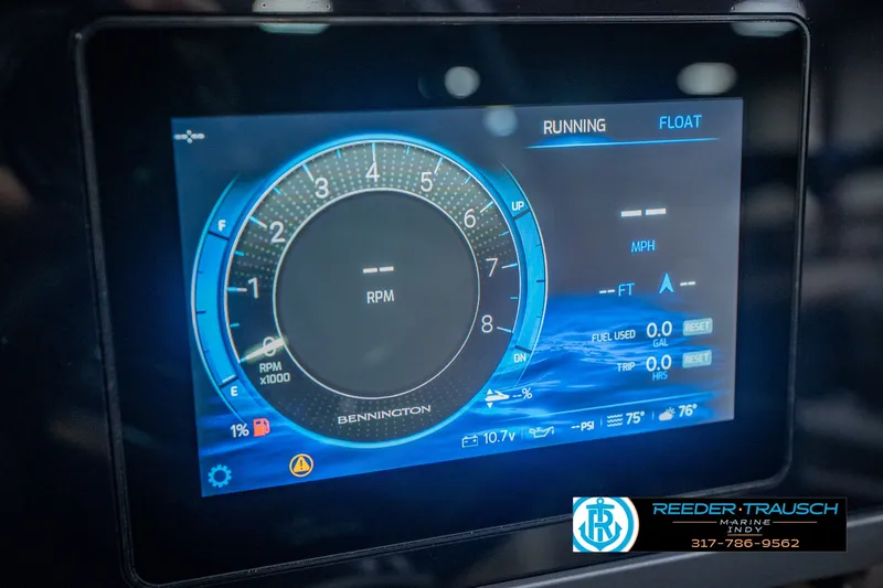 Slide: The Image of Digital dashboard display of a 2026 Bennington 24 MSB boat showing RPM and fuel data. - 43