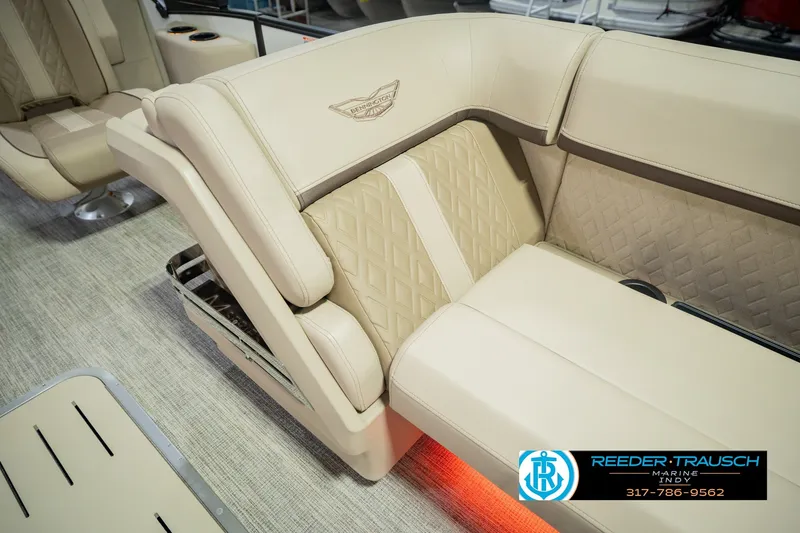 Slide: The Image of Luxurious seating on 2026 Bennington 24 MSB pontoon boat with beige upholstery and diamond stitching. - 28
