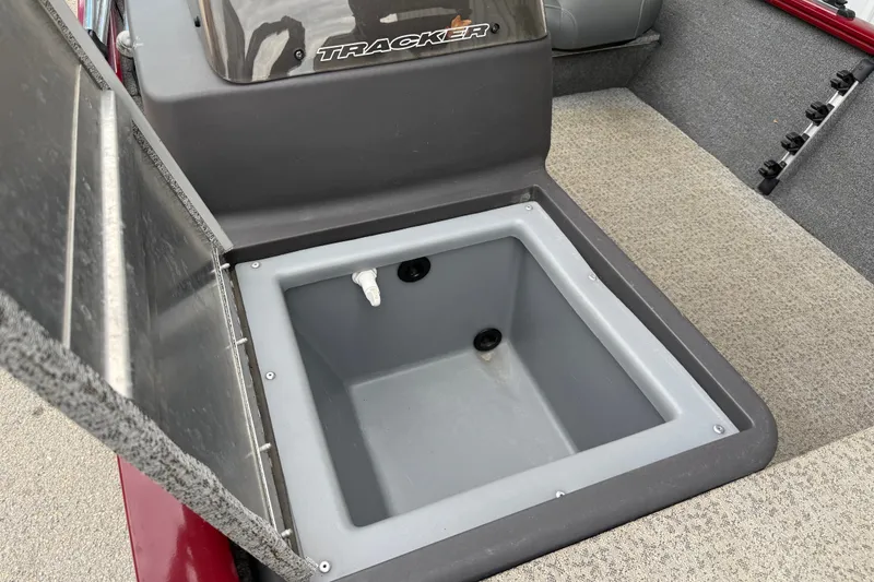 Slide: The Image of Open storage compartment in a 2020 Tracker Pro 160 boat. - 33
