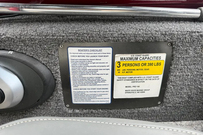 Slide: The Image of 2020 Tracker Pro 160 boat capacity label, showing maximum of 3 persons or 390 lbs. - 32