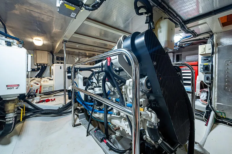 Slide: The Image of Engine room of 2008 Krogen 48 North Sea yacht, showcasing machinery and equipment. - 60