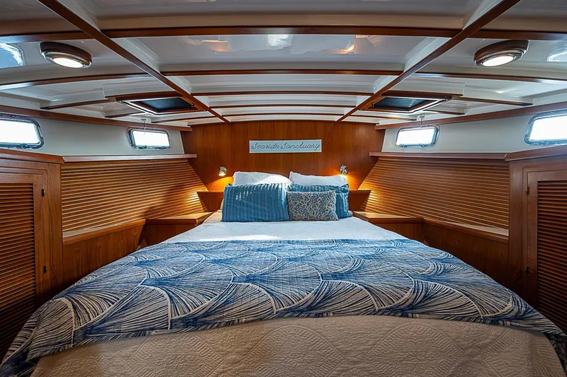 Slide: The Image of Luxurious cabin interior of 2008 Krogen 48 North Sea yacht with cozy bedding. - 31
