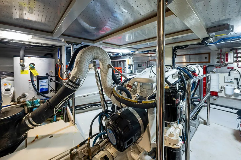 Slide: The Image of Engine room of 2008 Krogen 48 North Sea yacht, showcasing machinery and equipment. - 62
