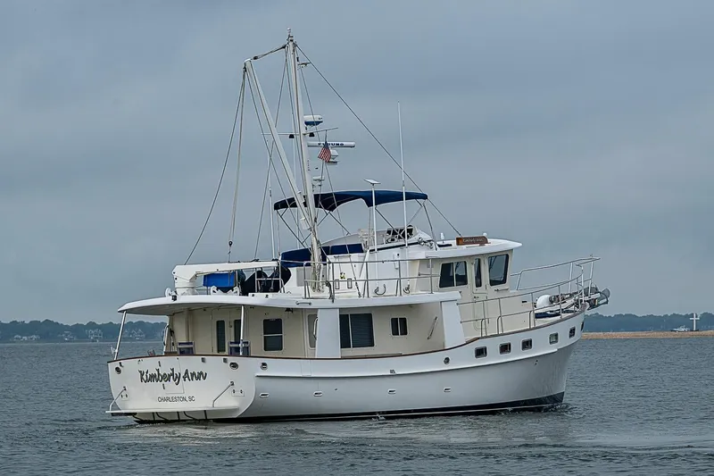 Slide: The Image of 2008 Krogen 48 North Sea yacht cruising on calm waters. - 7