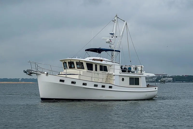 Slide: The Image of 2008 Krogen 48 North Sea yacht cruising on a calm, overcast day. - 9